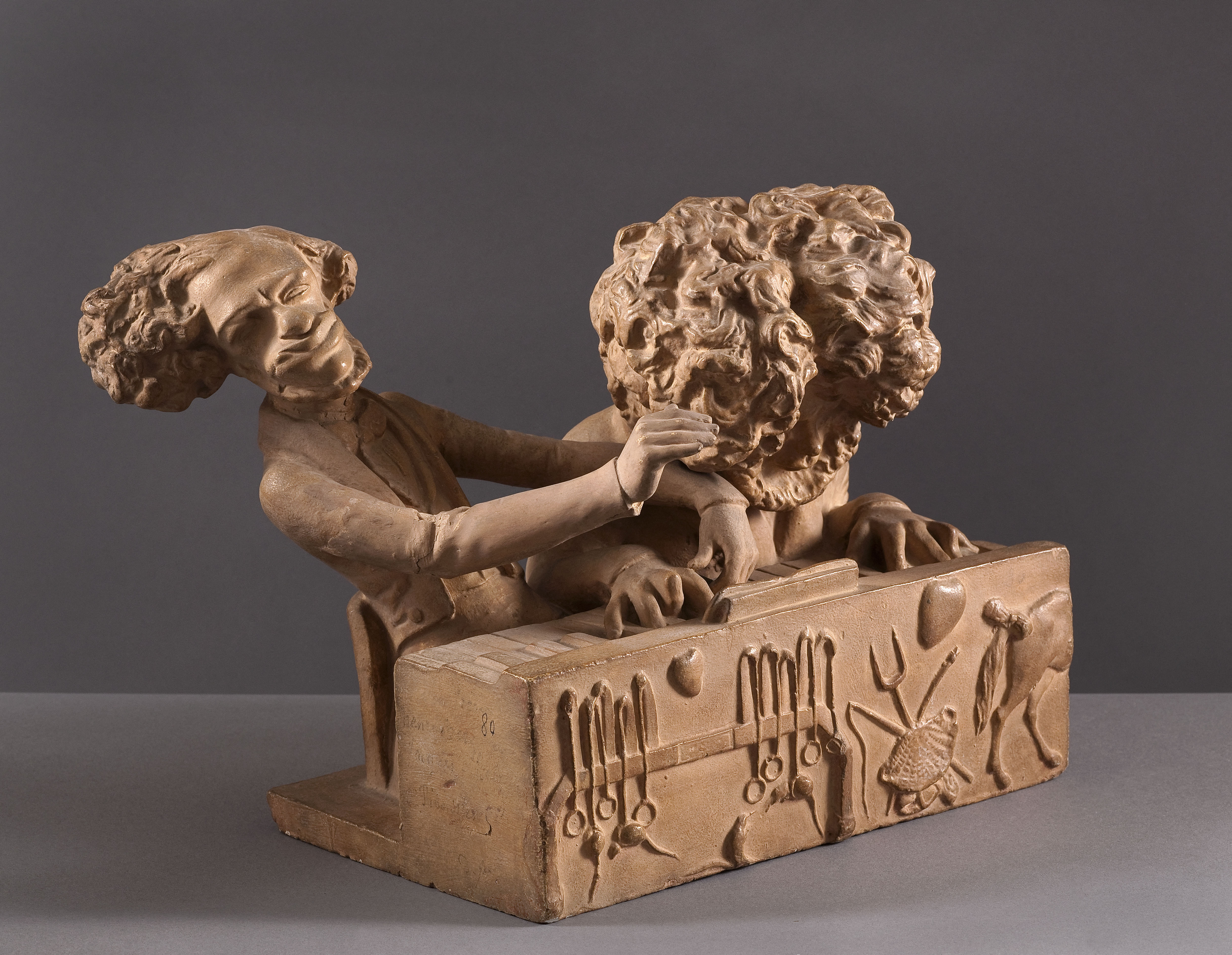 Herz at Piano with Brother Bust